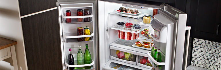 fr-open fridge with drinks and pastries inside